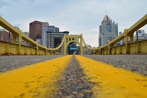 Bridge into the city photo by Wolfgang Stearns